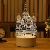 Acrylic night light with etched cathedral building design on a lit base