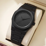Black matte steel octagonal watch with Arabic numeral dial resting on a display stand