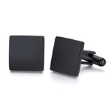 Angled view of black square cufflinks showing straight edges and silver post backs