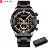 Black steel chronograph watch with rose gold accents and dark dial beside its box