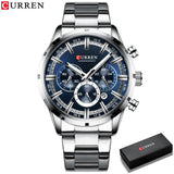 Silver steel blue chronograph watch standing upright beside a black gift box