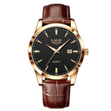 Gold case black dial watch with brown leather strap front facing view