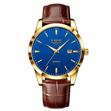 Gold case watch with blue dial and brown leather strap
