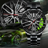 Black alloy car wheel design watch face with red brake caliper accent and sports car background