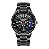 Black stainless steel car wheel watch with blue caliper accent on white background