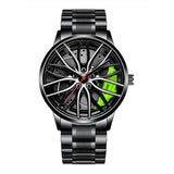 Black stainless steel car wheel watch with green caliper accent on white background