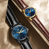 Gold case watches with blue and black dials and brown leather straps together