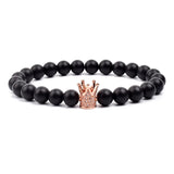 Black matte onyx bead bracelet with rose gold crown charm and beaded accents