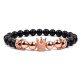 Black matte onyx bead bracelet with rose gold lion head charm