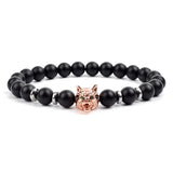 Black matte onyx bead bracelet with rose gold wolf head charm