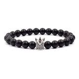 Black matte onyx bead bracelet with silver crown charm