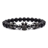 Black matte onyx bead bracelet with silver crown charm