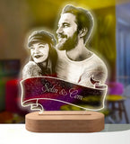 Custom etched acrylic photo lamp of a couple with names on a ribbon banner and wooden base
