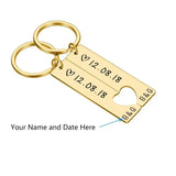 Gold bar keychain with heart cutout and text noting where custom name and date are engraved