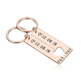 Rose gold stainless steel bar keychain engraved with a date and matching heart cutout