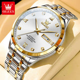 Two-tone silver and gold watch with white dial and day date window resting on a stand