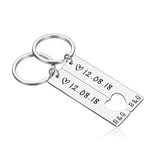 Silver engraved bar keychain with split heart design and split ring on white background