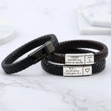 Black braided leather bracelets with engraved silver plates featuring custom text and heart charm