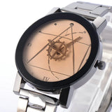 Silver steel watch with rose gold geometric dial on white background