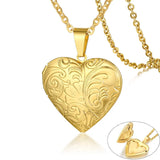 Gold heart locket with engraved scroll pattern shown with an inset of it opened