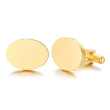 Pair of gold oval cufflinks with smooth polished faces and silver fittings