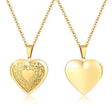 Two gold heart lockets on chains with engraved scroll detail and plain finishes