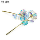 Blue and white gold plated rose with gold stem shown on white background