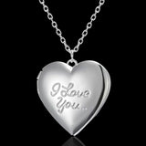 Silver heart locket engraved with the words I love you on a fine chain