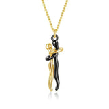 Gold chain necklace with black hugging couple 3D pendant
