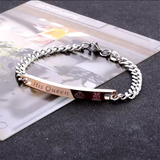 Steel chain bracelet with rose gold engraved bar shown in clear packaging