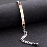 Stainless steel chain bracelet with engraved rose gold ID bar on white background