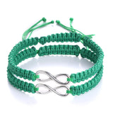 Green braided rope bracelet with a silver infinity charm
