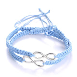 Light blue braided rope bracelet with a silver infinity charm