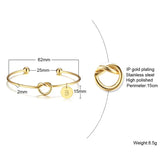 Spec card showing knot bangle measurements, plating details and weight