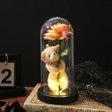 Blue and purple galaxy rose glowing under a glass dome on a dark base