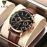 Black dial chronograph watch with rose gold case and brown leather strap in gift box