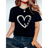 Black t-shirt with black heart and wing swirl graphic worn with denim
