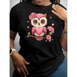 Black t-shirt with pink glitter owl and floral graphic worn by a woman