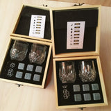 Whiskey stone gift sets in light and dark wood boxes with tumblers and granite cubes