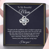 Silver love knot pendant necklace with crystal in a gift box with a To My Beautiful Mom message card