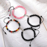 Pink and black matte stone bead bracelet pair with magnetic heart clasps