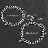 Silver heart charm bracelet shown with weight and size specification details