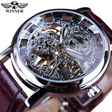 Silver case skeleton watch with exposed gears and brown leather strap