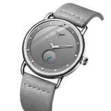 Angled grey dial ONOLA watch showing slim case profile and grey leather strap