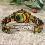 Silver case watch with camouflage patterned wooden bracelet strap