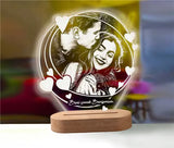 Printed photo night light of a couple styled beside a single red rose