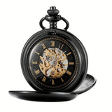 Black pocket watch closed showing engraved case and chain
