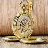 Gold mechanical pocket watch open showing skeleton dial and Roman numerals