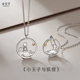 Silver prince and fox pendant necklaces displayed with Chinese storybook text