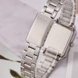 Close-up of the silver stainless steel bracelet and tonneau case side detail